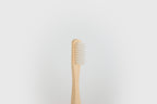 Brosse à dents en bois à l'unité, 4 coloris au choix