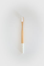 Brosse à dents en bois à l'unité, 4 coloris au choix